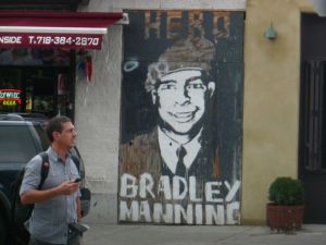 Political poster in support of 'wikileaker' Bradley Manning, Williamsburg, Brooklyn. Reads, "Hero Bradley Manning", and is roughly painted on wood panel